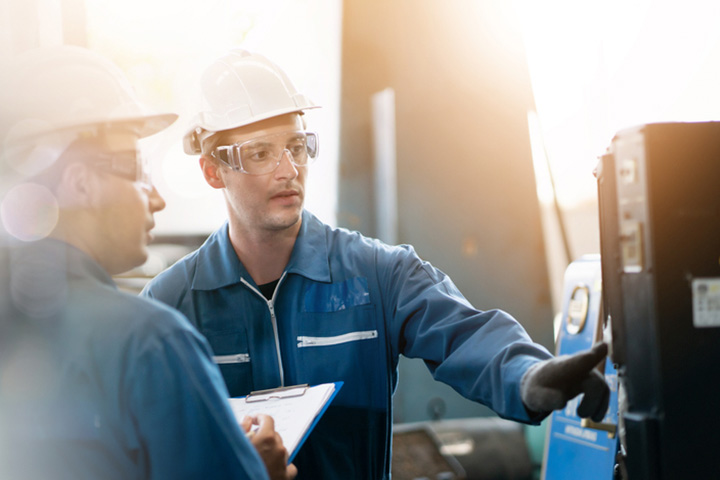 a gas production worker monitoring the facility's production 01